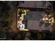Night-time aerial view of house with pool and lighting at 11132 E Juan Tabo Rd, Scottsdale, AZ 85255