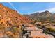 Stunning aerial view of homes and mountains at 11132 E Juan Tabo Rd, Scottsdale, AZ 85255