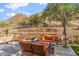 Landscaped backyard with firepit and seating area at 11132 E Juan Tabo Rd, Scottsdale, AZ 85255