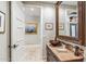Powder room with ornate mirror and vessel sink at 11132 E Juan Tabo Rd, Scottsdale, AZ 85255