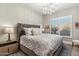 Comfortable bedroom with a king-size bed and light-filled room at 11132 E Juan Tabo Rd, Scottsdale, AZ 85255