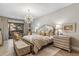 Luxurious bedroom with king-size bed, and access to a private patio at 11132 E Juan Tabo Rd, Scottsdale, AZ 85255