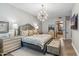 Spacious bedroom with king-size bed and ensuite bathroom access at 11132 E Juan Tabo Rd, Scottsdale, AZ 85255