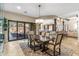 Bright dining room with kitchen and patio views at 11132 E Juan Tabo Rd, Scottsdale, AZ 85255