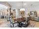 Elegant dining room with access to kitchen and living areas at 11132 E Juan Tabo Rd, Scottsdale, AZ 85255