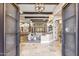 Grand entry with high ceilings, chandelier, and views to living area at 11132 E Juan Tabo Rd, Scottsdale, AZ 85255