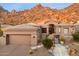 Single story home with desert landscaping at 11132 E Juan Tabo Rd, Scottsdale, AZ 85255
