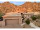 Single story home with desert landscaping at 11132 E Juan Tabo Rd, Scottsdale, AZ 85255