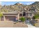 Beautiful desert contemporary home with a three-car garage at 11132 E Juan Tabo Rd, Scottsdale, AZ 85255