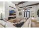 Living area with fireplace and built-in entertainment center at 11132 E Juan Tabo Rd, Scottsdale, AZ 85255
