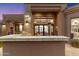 Built-in outdoor kitchen with grill, counter space at 11132 E Juan Tabo Rd, Scottsdale, AZ 85255