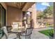 Covered patio with outdoor dining and mountain views at 11132 E Juan Tabo Rd, Scottsdale, AZ 85255