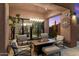 Cozy fire pit and seating area on covered patio at 11132 E Juan Tabo Rd, Scottsdale, AZ 85255