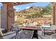 Comfortable patio seating area with fire pit and stunning mountain views at 11132 E Juan Tabo Rd, Scottsdale, AZ 85255
