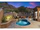 Inviting kidney-shaped pool with surrounding patio at 11132 E Juan Tabo Rd, Scottsdale, AZ 85255