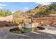 Inviting kidney-shaped pool and spa with mountain views at 11132 E Juan Tabo Rd, Scottsdale, AZ 85255
