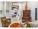 Cozy sitting area features comfortable seating and views to the living room at 11132 E Juan Tabo Rd, Scottsdale, AZ 85255