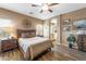 Spacious bedroom with wood flooring and a ceiling fan at 1416 W Birch Rd, San Tan Valley, AZ 85140