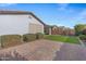 Artificial turf backyard with patio and string lights at 20865 E Timberline Rd, Queen Creek, AZ 85142