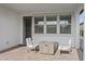 Covered patio with fire pit and comfortable seating at 20865 E Timberline Rd, Queen Creek, AZ 85142