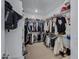 Spacious walk-in closet with ample shelving and hanging space at 20865 E Timberline Rd, Queen Creek, AZ 85142