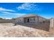 House exterior showcasing backyard and patio at 21576 E Pecan Ct, Queen Creek, AZ 85142