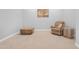 Finished basement with recliner and coffee table at 21576 E Pecan Ct, Queen Creek, AZ 85142