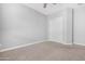 Simple bedroom with a closet and ceiling fan at 21576 E Pecan Ct, Queen Creek, AZ 85142