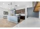 Modern kitchen with stainless steel appliances and a large island at 21576 E Pecan Ct, Queen Creek, AZ 85142