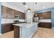Modern kitchen featuring stainless steel appliances and a large island at 21576 E Pecan Ct, Queen Creek, AZ 85142