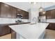 Modern kitchen with stainless steel appliances and a large island at 21576 E Pecan Ct, Queen Creek, AZ 85142