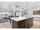 Modern kitchen with a large island and stainless steel appliances at 21576 E Pecan Ct, Queen Creek, AZ 85142