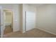 Bright bedroom with large closet and access to bathroom at 3214 N Desert Horizons Ln, Casa Grande, AZ 85122