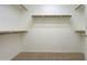 Large walk-in closet with double hanging rods at 3214 N Desert Horizons Ln, Casa Grande, AZ 85122