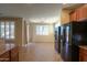 Kitchen with breakfast nook and access to backyard at 3214 N Desert Horizons Ln, Casa Grande, AZ 85122