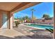 Relaxing backyard oasis with sparkling pool and patio at 3214 N Desert Horizons Ln, Casa Grande, AZ 85122