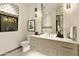 Elegant bathroom featuring a stylish vanity and mosaic tile at 5630 E Rockridge Rd, Phoenix, AZ 85018