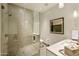Modern bathroom with a large shower and updated fixtures at 5630 E Rockridge Rd, Phoenix, AZ 85018