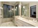 Spa-like bathroom with a walk-in shower and vanity at 5630 E Rockridge Rd, Phoenix, AZ 85018