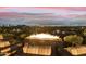 Fire pit with seating area and panoramic city views at 5630 E Rockridge Rd, Phoenix, AZ 85018