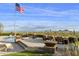 Enjoy breathtaking views from the fire pit area next to the pool and spa at 5630 E Rockridge Rd, Phoenix, AZ 85018