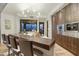Modern kitchen with wood island, stainless steel appliances, and city views at 5630 E Rockridge Rd, Phoenix, AZ 85018