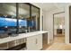 Modern kitchen with built-in appliances and butler's pantry at 5630 E Rockridge Rd, Phoenix, AZ 85018