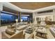 Spacious living room with city views and high ceilings at 5630 E Rockridge Rd, Phoenix, AZ 85018