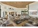 Open concept living room with high ceilings and natural light at 5630 E Rockridge Rd, Phoenix, AZ 85018