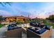 Inviting backyard with a fire pit and comfortable seating at 6450 E Bent Tree Dr, Scottsdale, AZ 85266