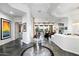 Bright and spacious entryway with high ceilings and modern art at 6450 E Bent Tree Dr, Scottsdale, AZ 85266