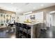 Modern kitchen with large island and stainless steel appliances at 6450 E Bent Tree Dr, Scottsdale, AZ 85266
