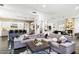 Open living room and kitchen with comfortable seating at 6450 E Bent Tree Dr, Scottsdale, AZ 85266