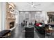 Elegant living room with a fireplace and stylish furniture at 6450 E Bent Tree Dr, Scottsdale, AZ 85266
